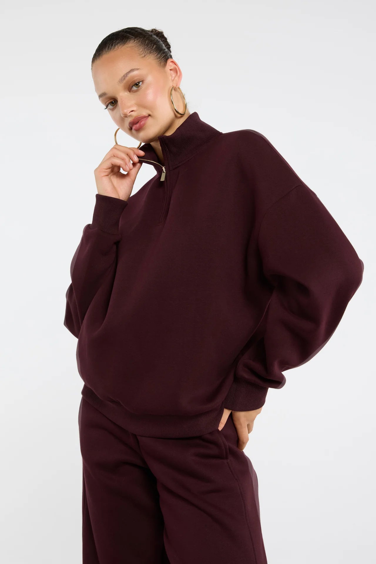 Sudadera con cremallera y cuello alto